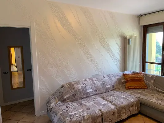 102-ant-sito-decorazione-parete-sala.webp